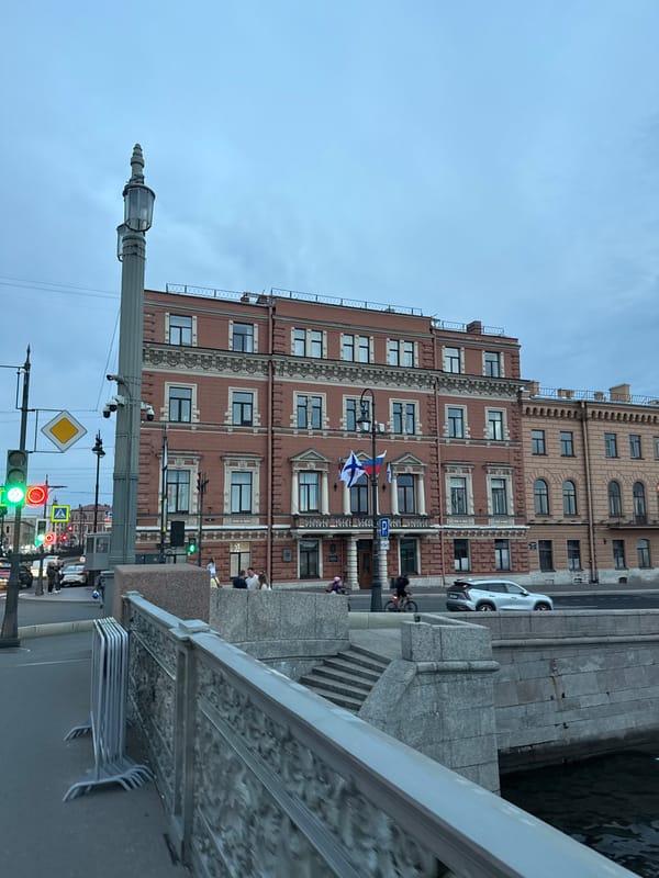Saint Petersburg's historic streetscape at dusk, canals and all