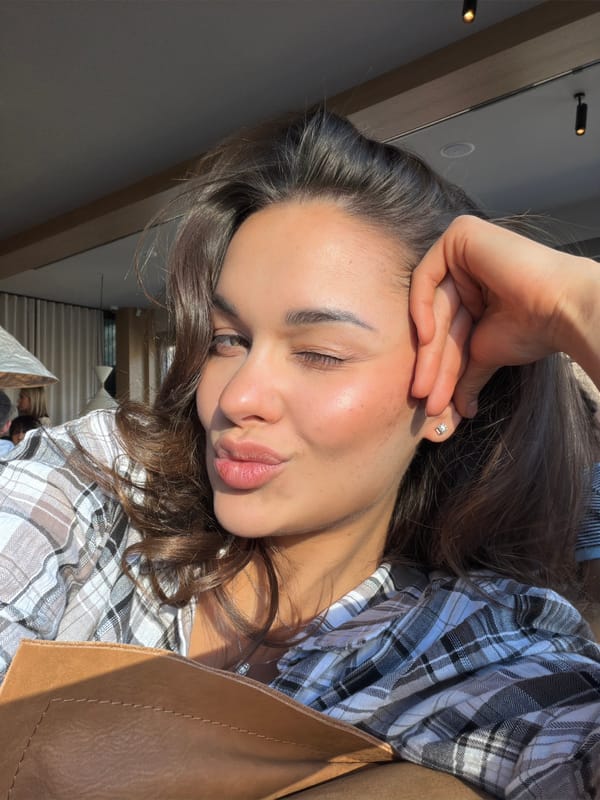 Woman documents meal preparation in Krasnoyarsk apartment