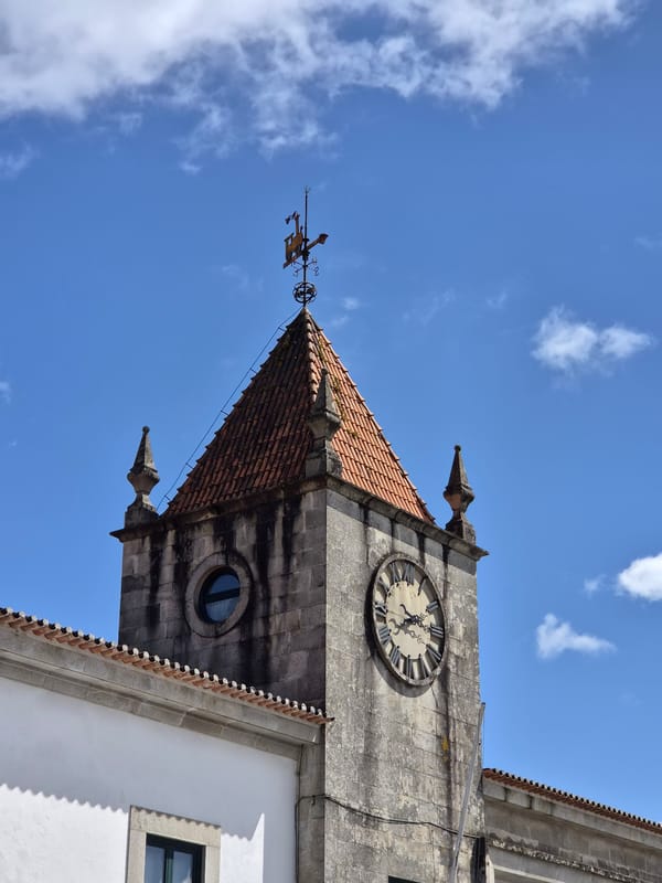 Afternoon scenes captured in Barcelos, Portugal featuring clock tower