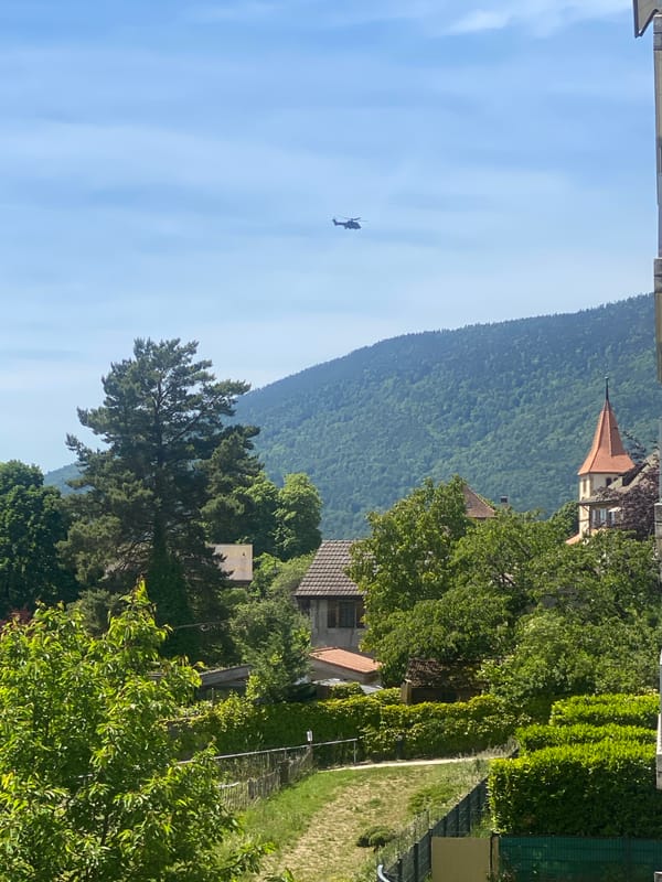 Helicopter spotted over forested Milvignes landscape on sunny morning