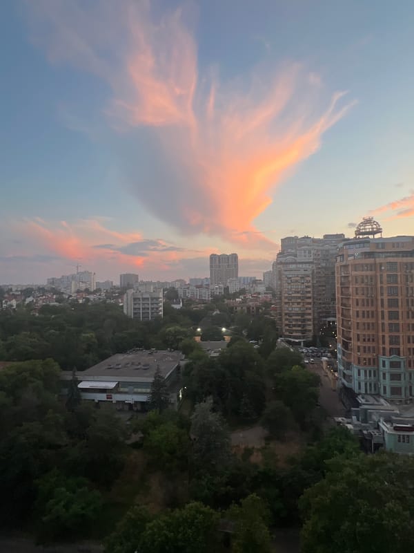 Sunset clouds glow over Odesa at dusk