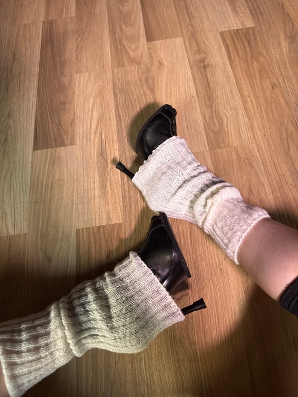 Indoor gathering documented in Sofia featuring distinctive fashion choices