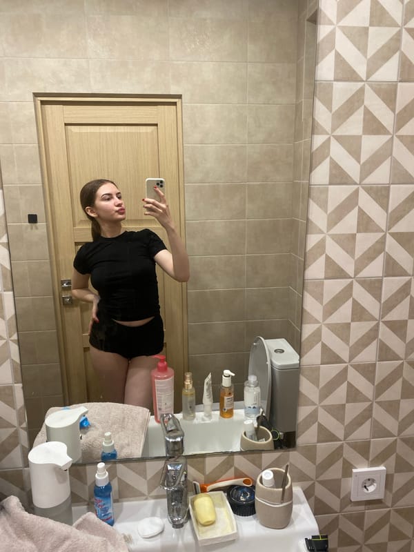 Young woman documents evening routine in Semyonov, Russia