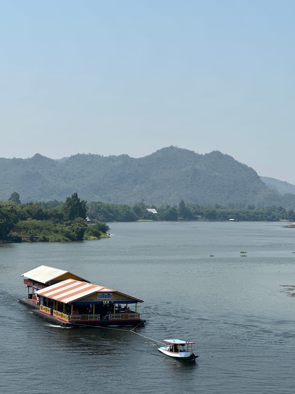 Tourists visit glass skywalk over River Kwai in Thailand