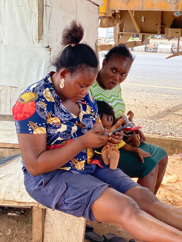Family moment captured outdoors in Zango-ndaji, Nigeria