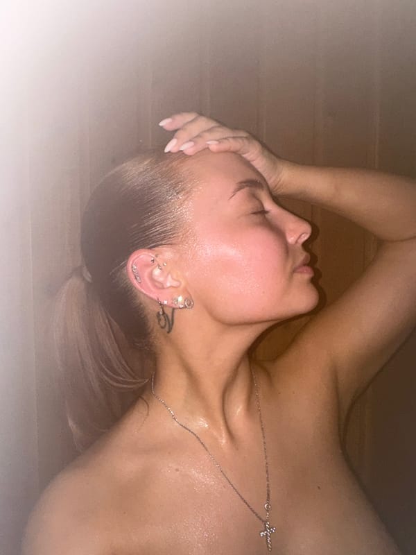 Woman observed relaxing in sauna facility in Chastyye, Russia