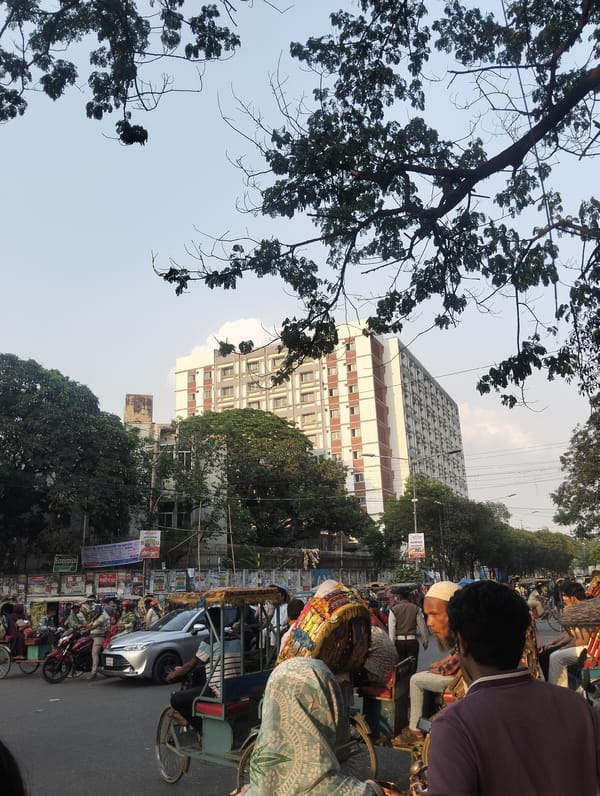 Daily street life documented across Dhaka neighborhoods Friday morning