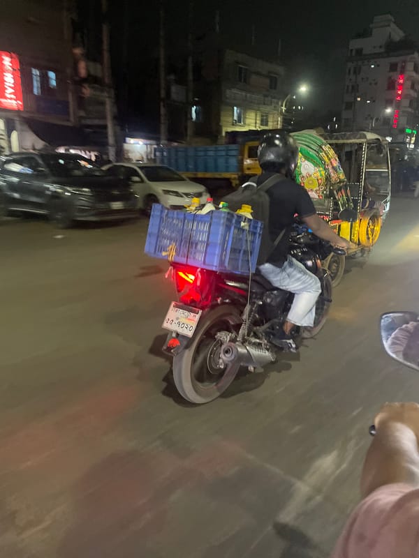 Motorcyclist with cargo spotted on Dhaka street
