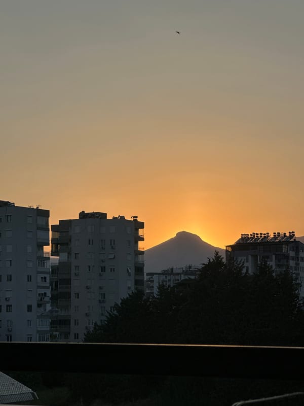 Golden hour over Konyaaltı with the Taurus Mountains behind
