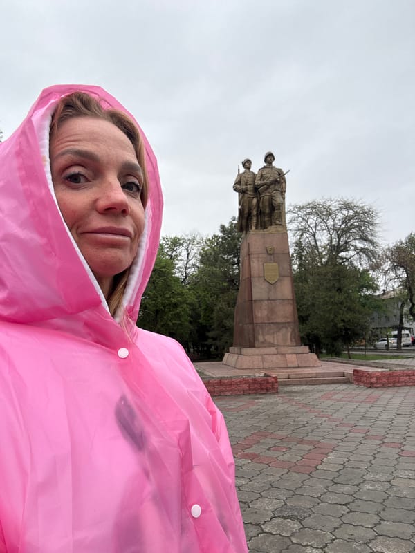 Tourist documents rainy morning walk through central Bishkek