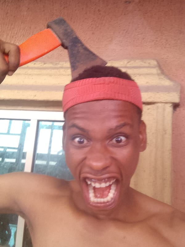 Man in red headband escalates from haircut to ax incident