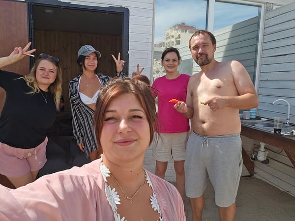 Backyard cookout and toast at a rustic Yevpatoriya patio