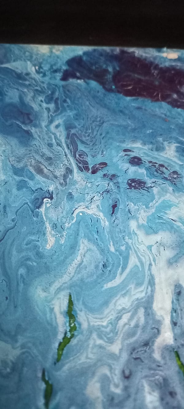Artist documents paintings and objects in Ukrainian studio session