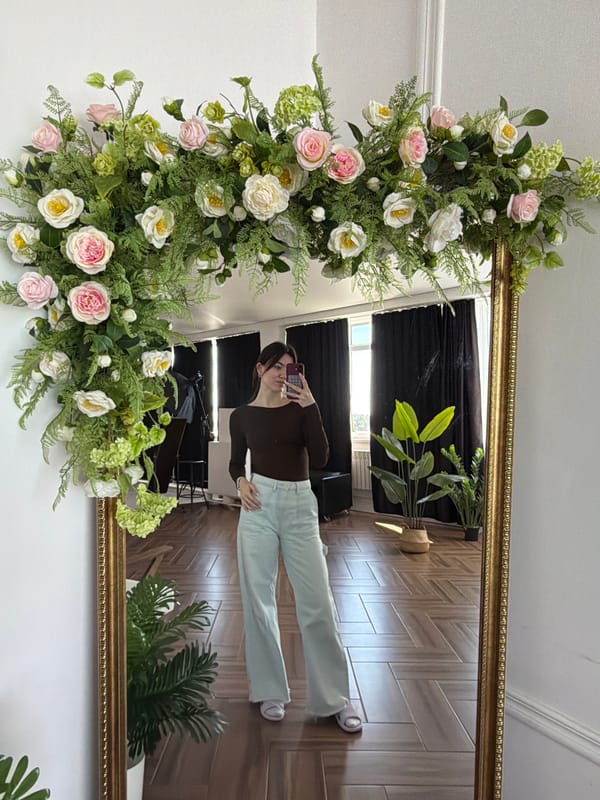Woman documents morning routine through mirror selfies in Chaikovsky