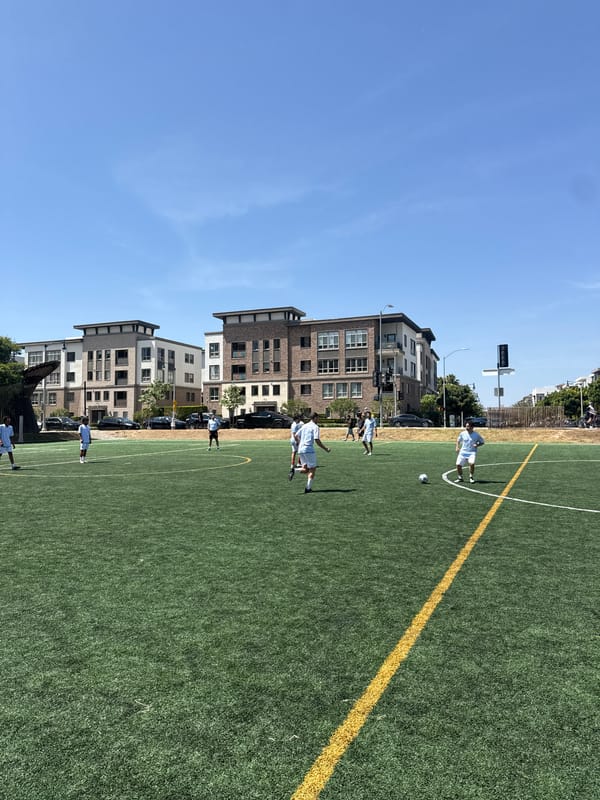 Soccer game underway on Los Angeles artificial turf field