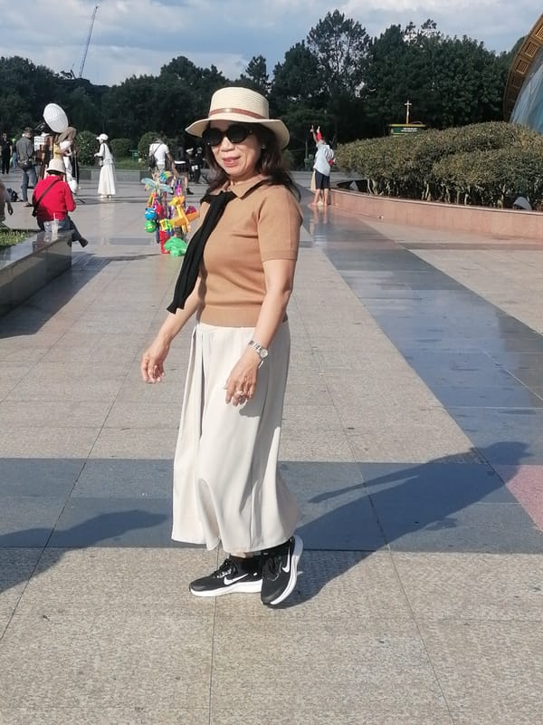Morning crowd at a modern public walkway in Da Lat