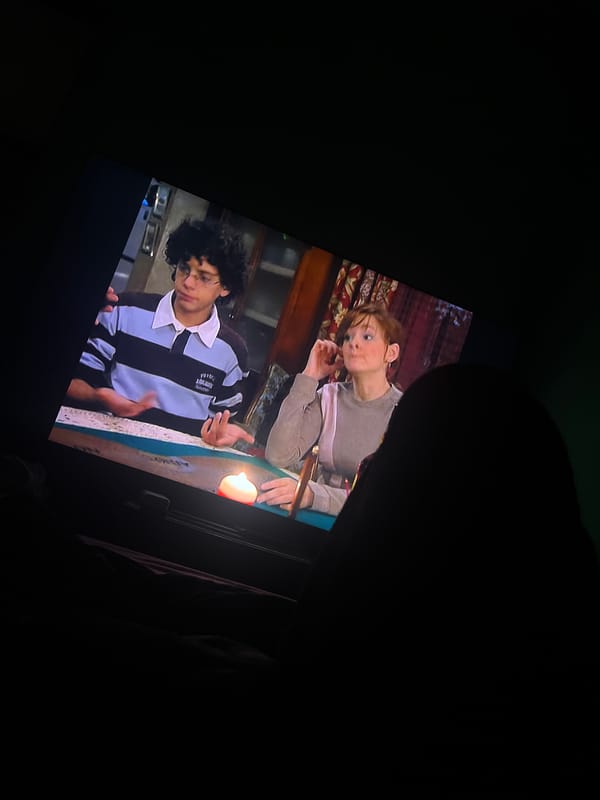Screen display captures two people in Barcelona