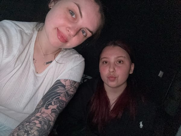 Two women rest together in Chornomorskoe, Ukraine