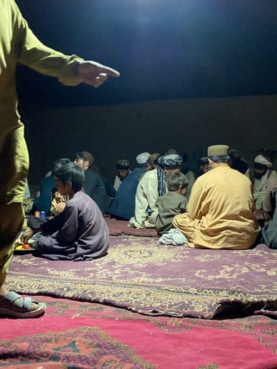 Community meal gathering observed in Dehkheshk, Afghanistan