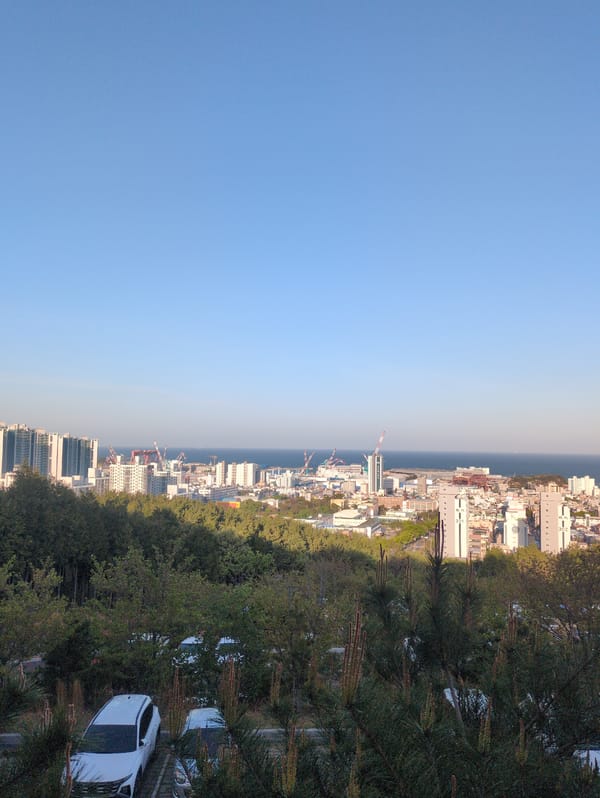 Clear morning skies captured over Ulsan cityscape from elevated viewpoint