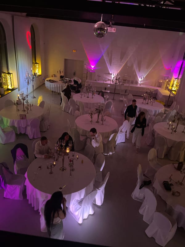 Evening documentation of event venues and retail spaces in Saarbrücken