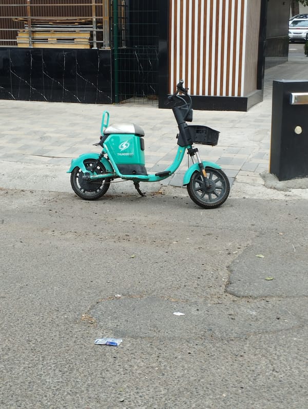 Street-level Tashkent: shops, scooters, and small moments
