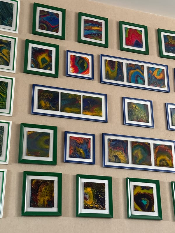 Fluid abstract art collection displayed at home, with everyday moments