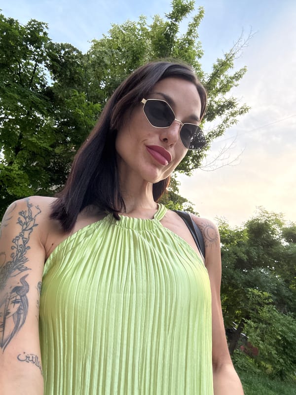 Woman takes multiple selfies in green dress around Pleven