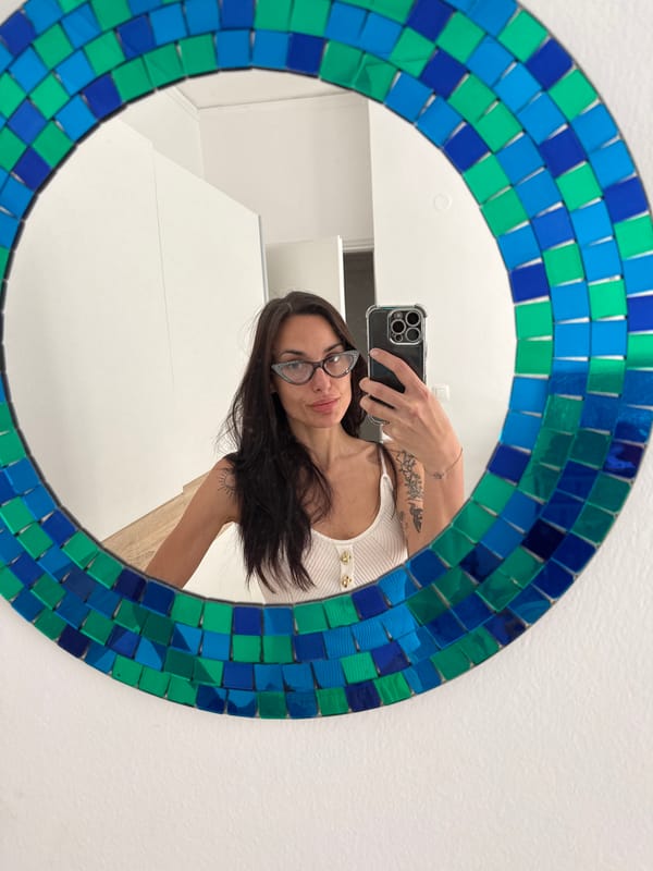 Woman enjoys morning coffee in Chania kitchen