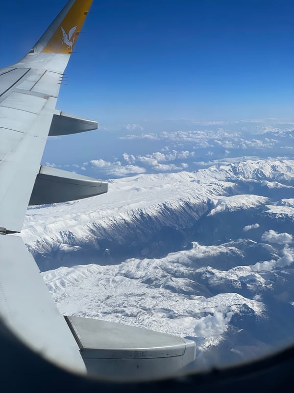 Pegasus Airlines passenger photographs snowy mountains over Turkey