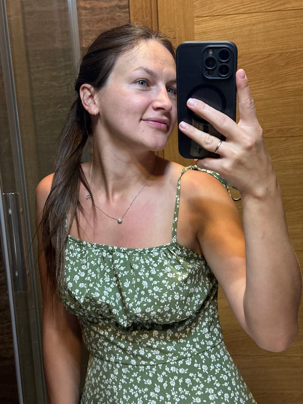 Woman documents evening routine in Montenegro bathroom selfie session
