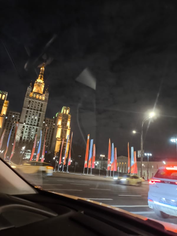 Nighttime Moscow street view captured from moving vehicle
