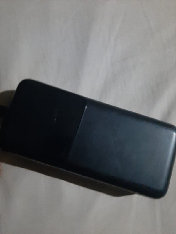Electronic device resting on textured surface