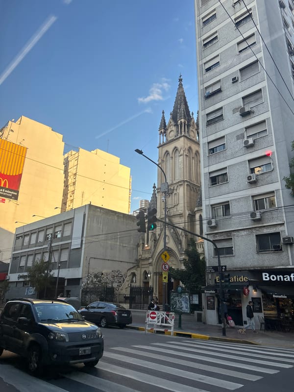Buenos Aires street scene features neo-Gothic basilica architecture