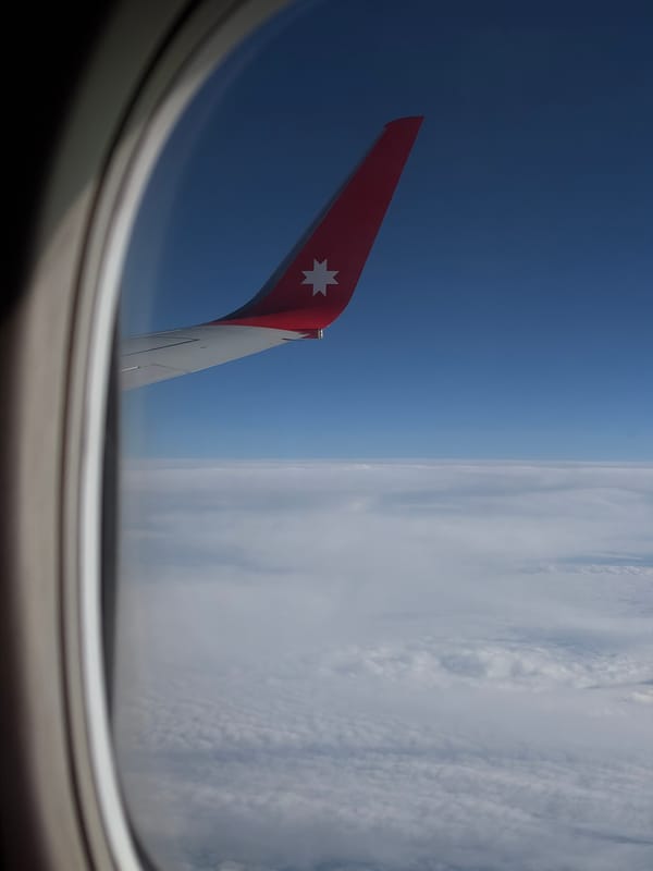 Aircraft wing with star emblem photographed over Domodedovo