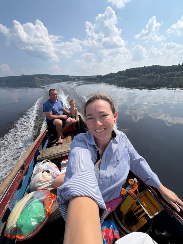 Boat ride on a calm Russian lake on a sunny morning