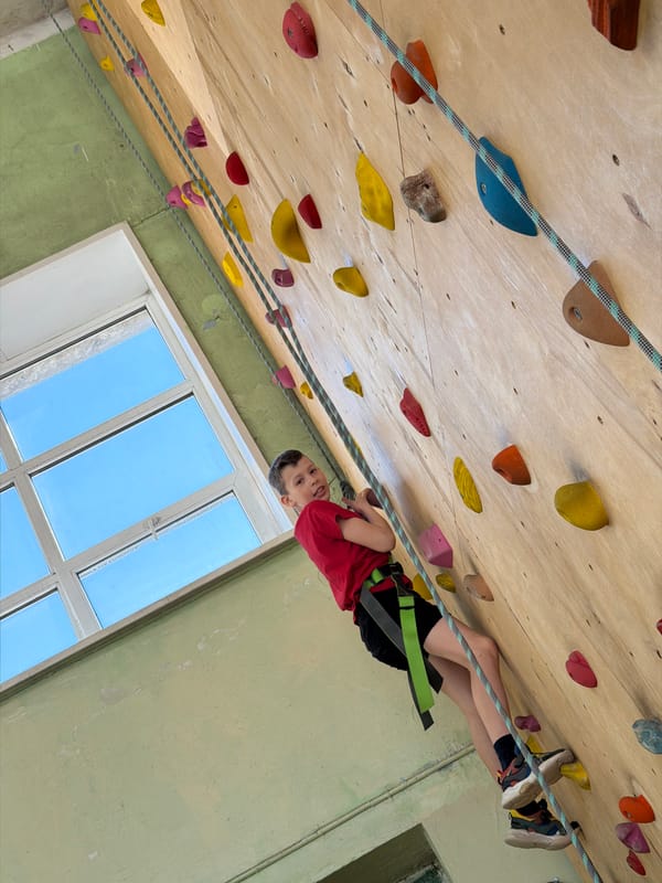 Young climbers practice indoor rock climbing in Izhevsk facility