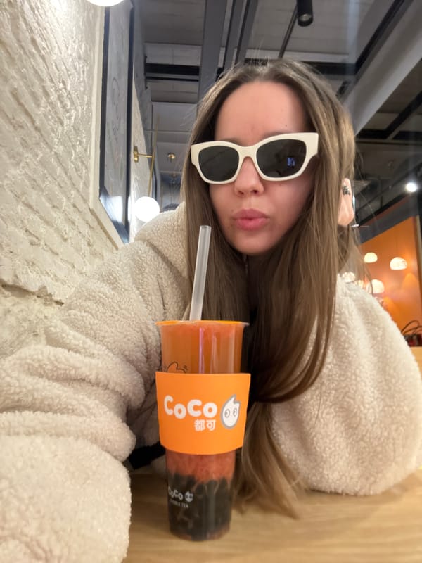 Woman enjoys bubble tea at Barcelona cafe