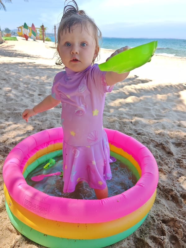 Beach selfies and toddler pool time in Phu Thuy Ward