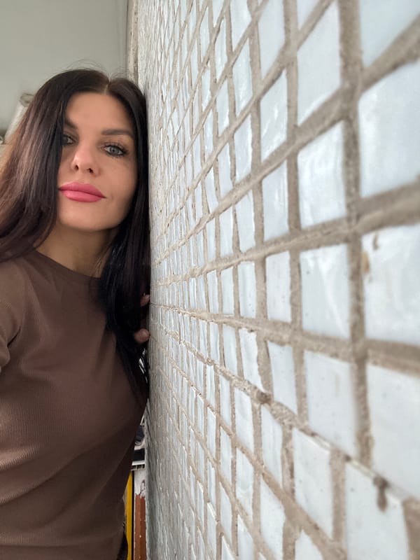 Woman photographed in multiple indoor settings in Chaikovsky