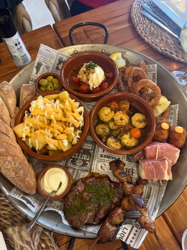 Tapas platter documented at Spanish coastal restaurant