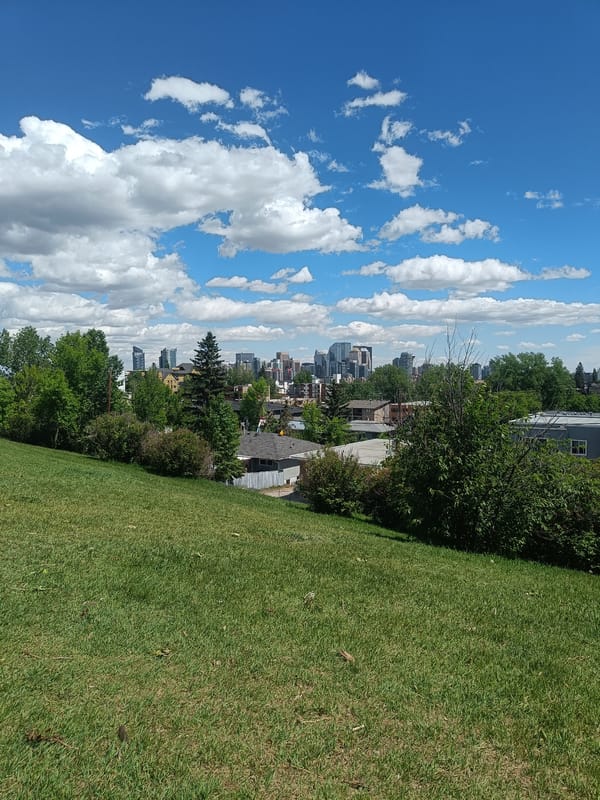 Clear skies documented over Calgary on sunny June afternoon