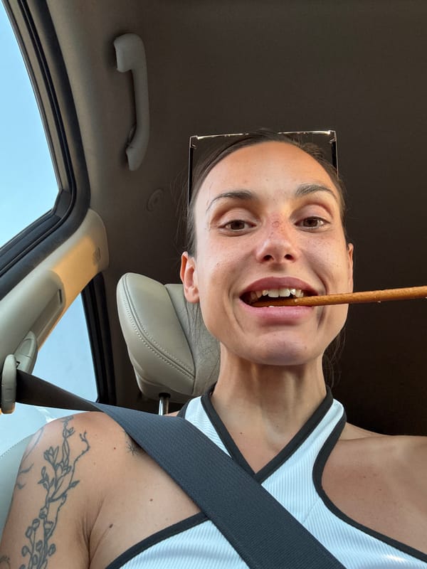Snacking on a pretzel stick mid-ride through Bulgaria