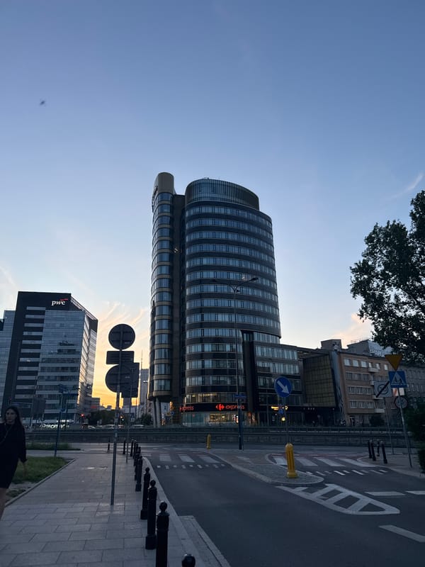 Evening street-level drift through a European urban neighborhood
