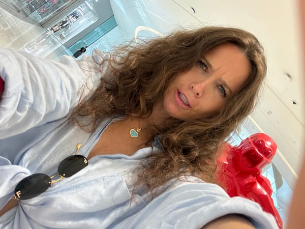 Woman takes selfies at Dubai mall with art displays