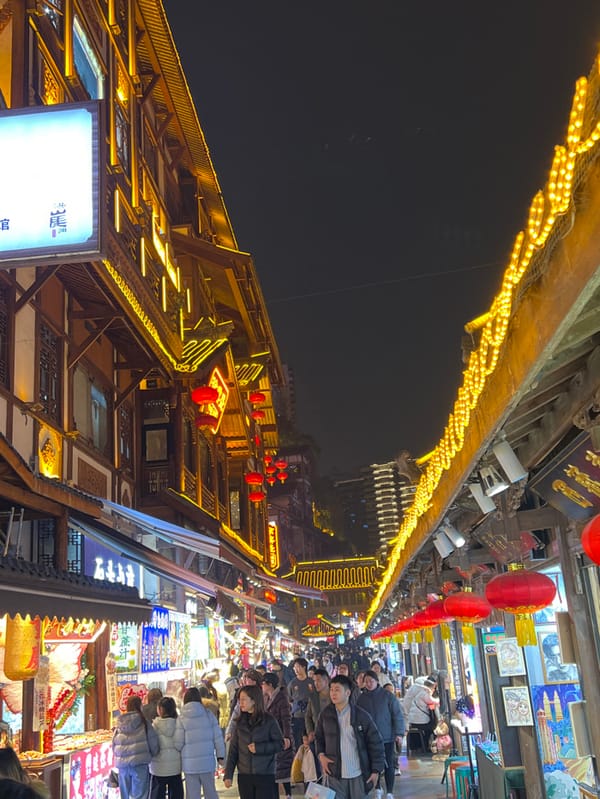 Evening crowds gather at Hongyadong Commercial Street, Chongqing