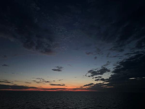 Twilight sky documented over water near Baltic Sea