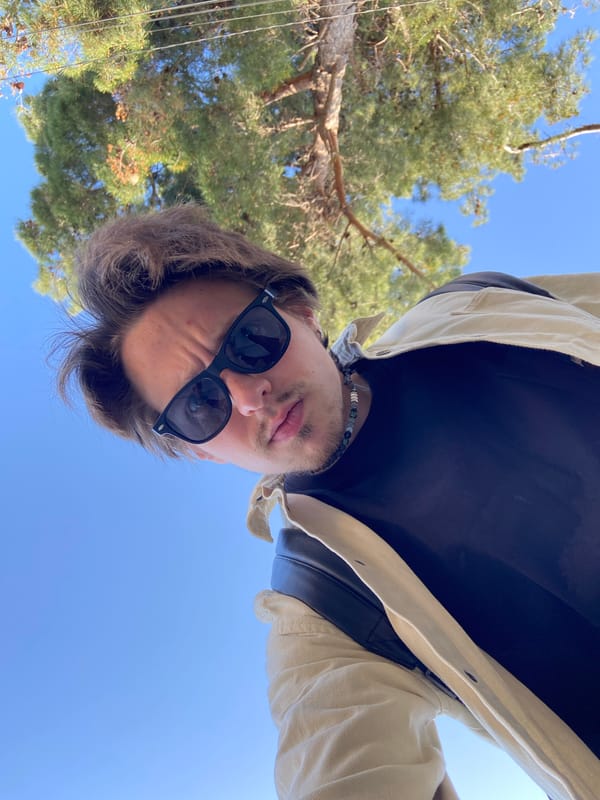 Man poses for photos in Šušanj, Montenegro