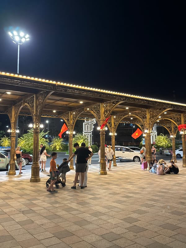 Night scene captured at illuminated arcade in Nha Trang