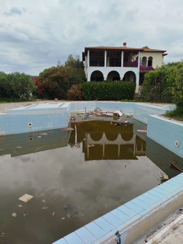 Abandoned pools, blooming flowers documented in rural Greek peninsula